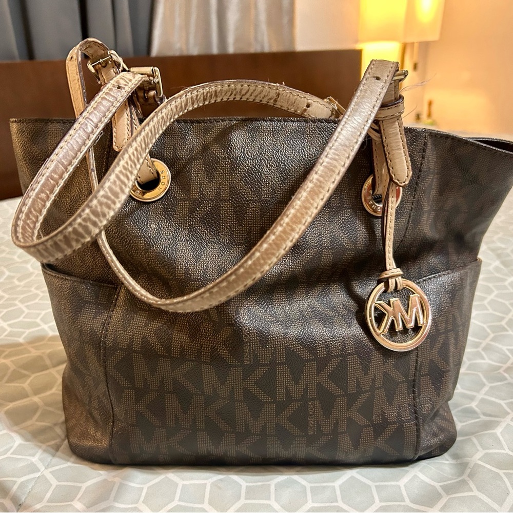 Brown MK women bag.